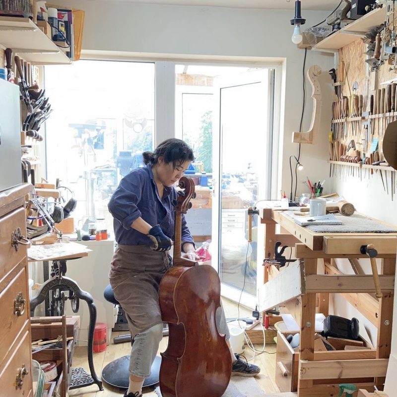 Eunju Lee, Stringed Instrument Maker, in her workshop