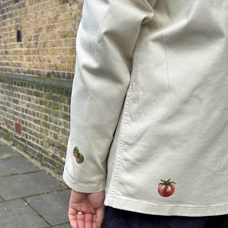 Male model wearing a bespoke, hand painted jacket