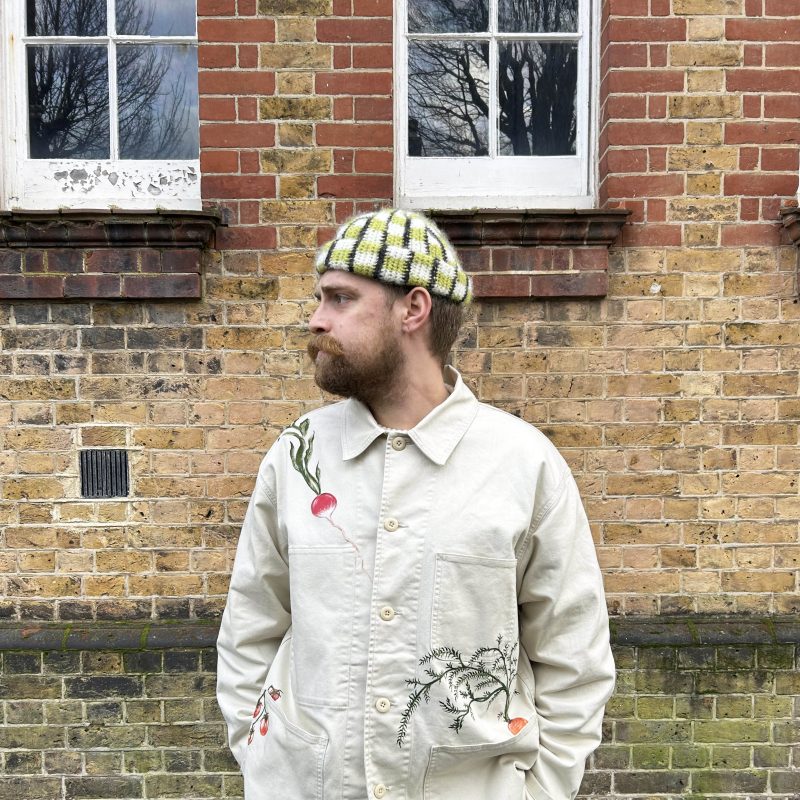 Male model wearing a bespoke, hand painted jacket