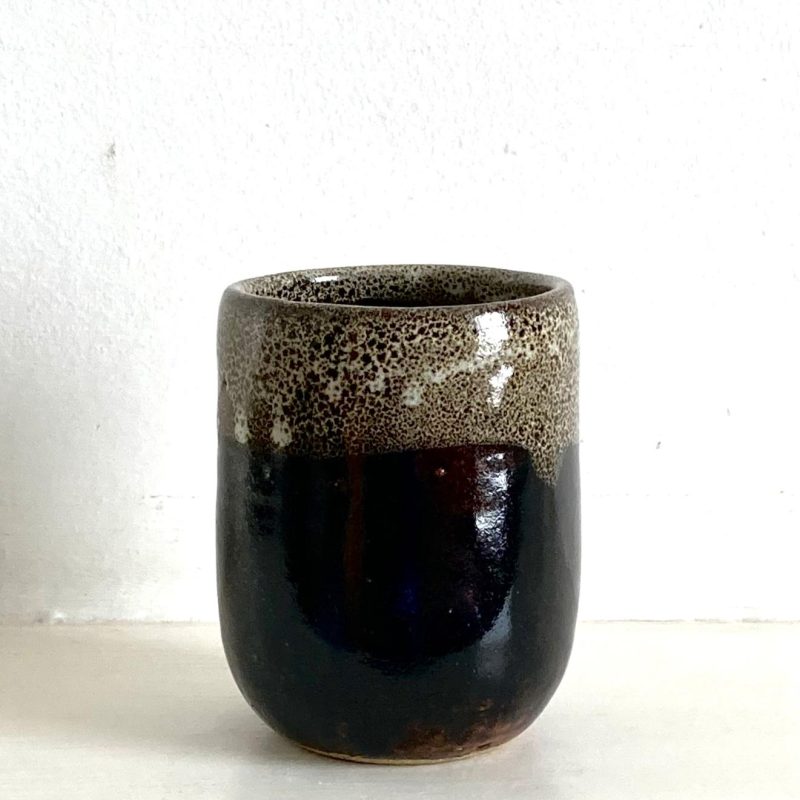 Hand thrown pottery - large cup, without a handle, glazed in tammoku (Japanese inspired brown ) and white dipped or dropped glaze, Perfect size for a good sized coffee or tea.