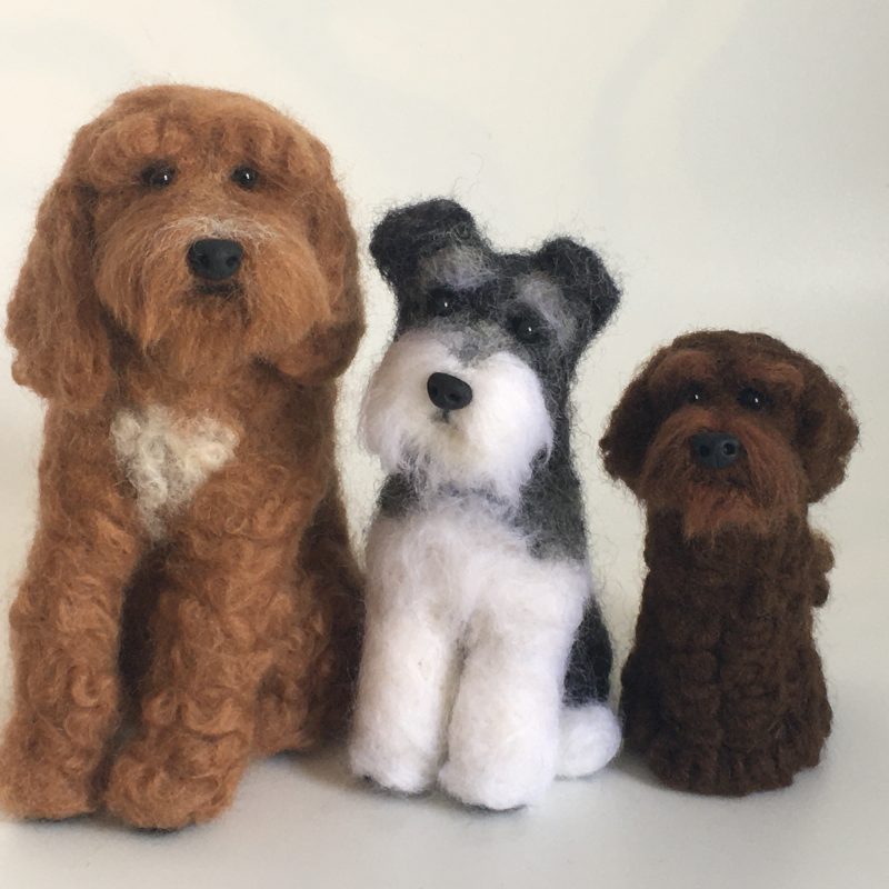 3 dog caricatures created in Needle felt