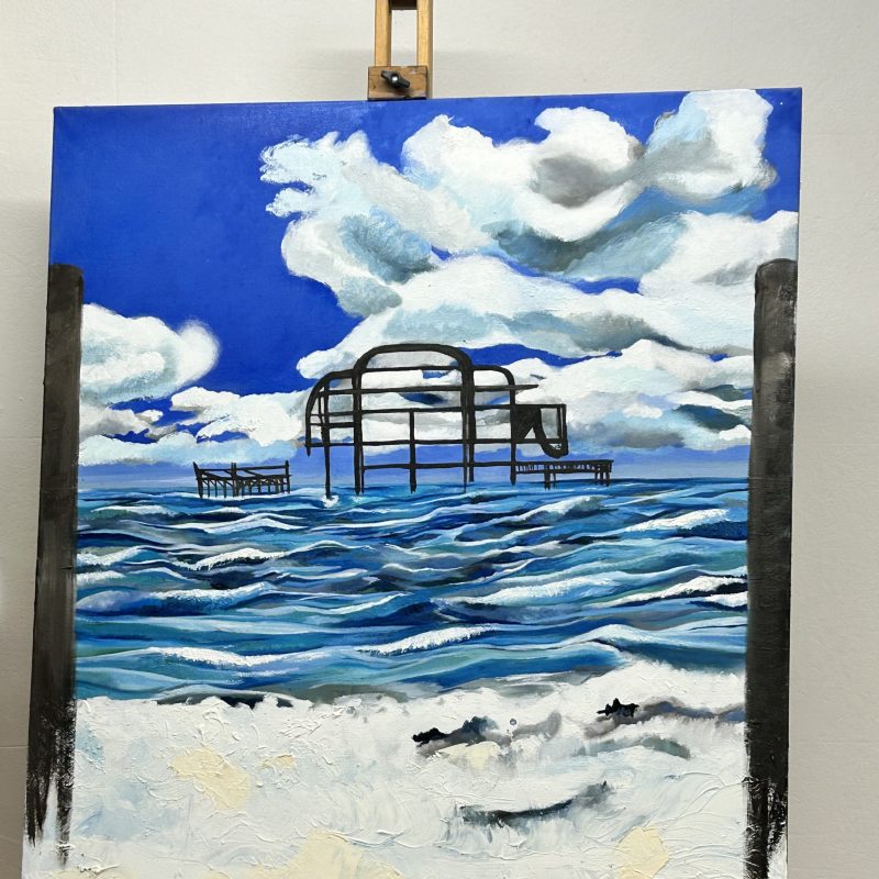 A work in progress: The west pier in a stormy sea with many blues and rough waves. 