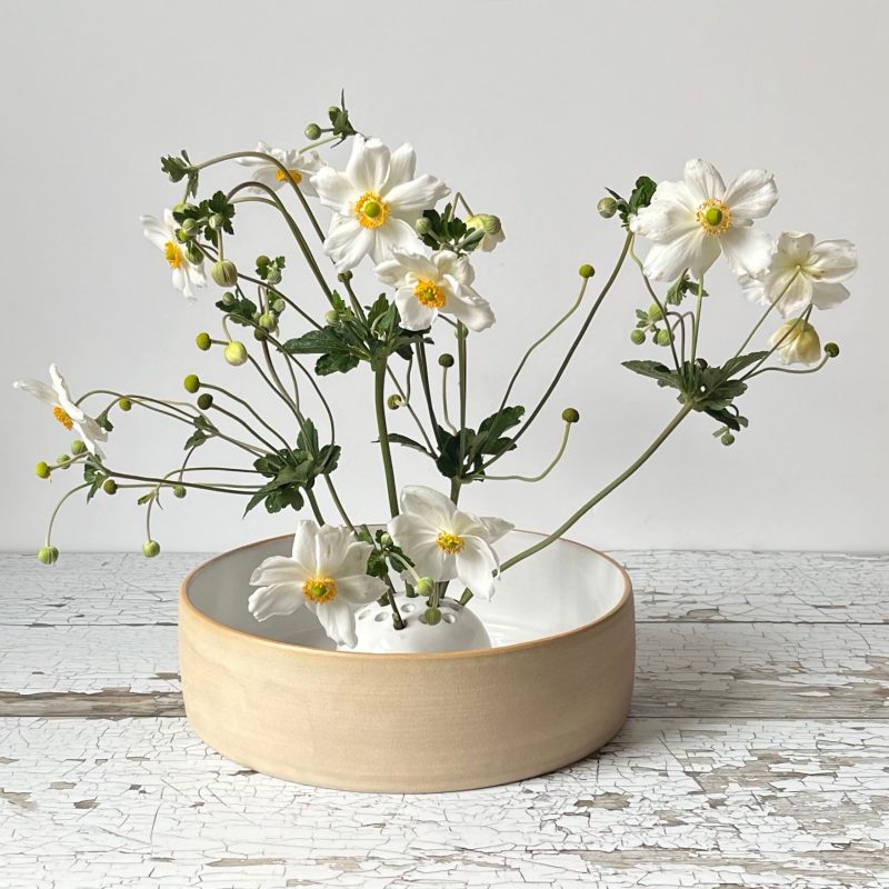 Two piece set flower stone and dish made from stoneware clay and tin white glaze.