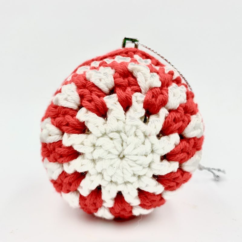 Crochet bauble Christmas decoration in red and white cotton yarn