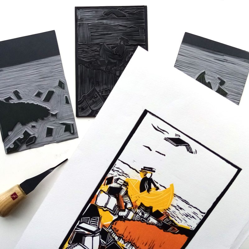 A 3 colour lino cut in black, orange, yellow on white paper of a figure in a boat in a sea of books.  A wonderful print for book lovers everywhere!