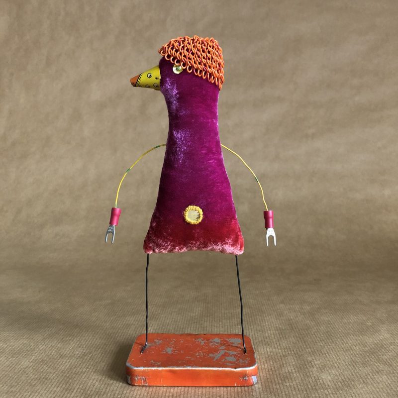 Sculptural textile figure using recycled metal and velvet