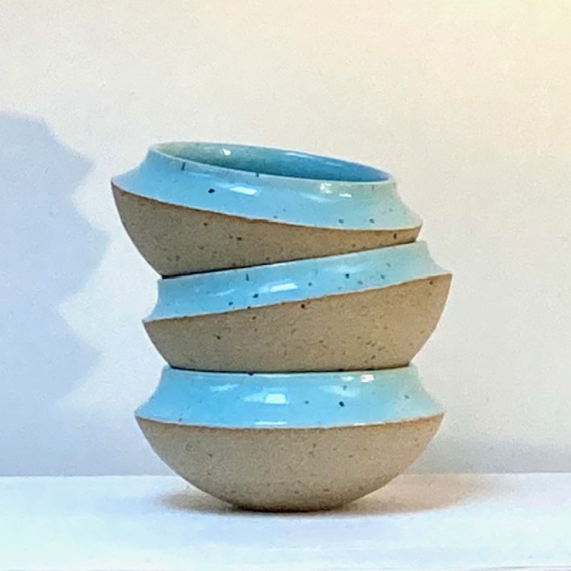 set of three bowls with blue glaze