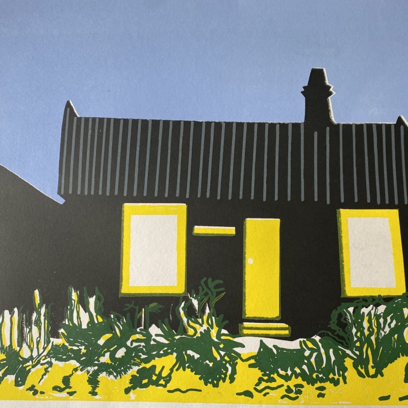 Image of a house with vibrant blocks of colour in yellow, black, blue and green