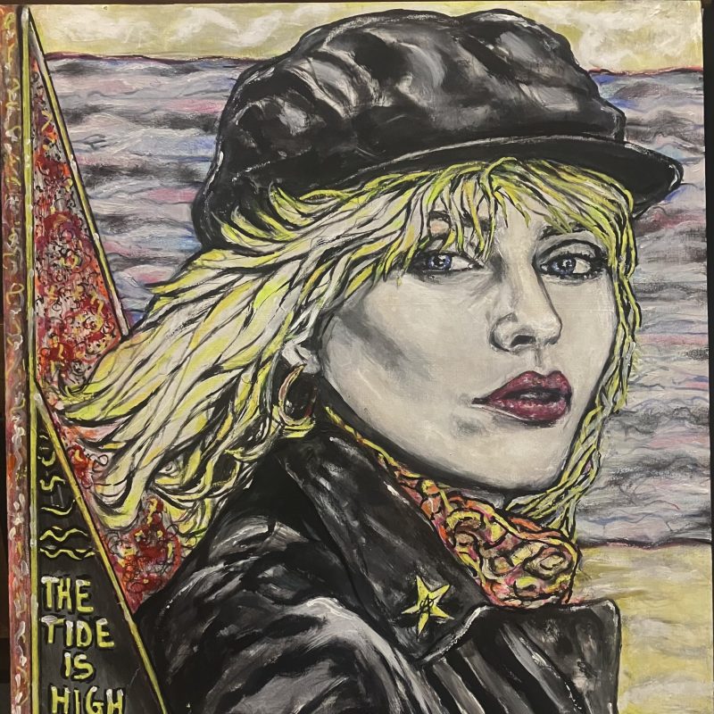 A portrait of Blondie (Debby Harry) at night with the words 'the tide is high but I'm holding on'