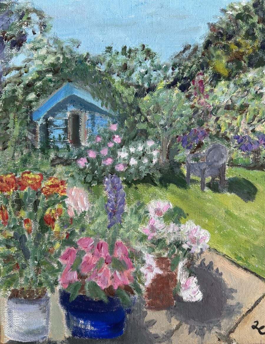 Garden in midsummer, full of colour.