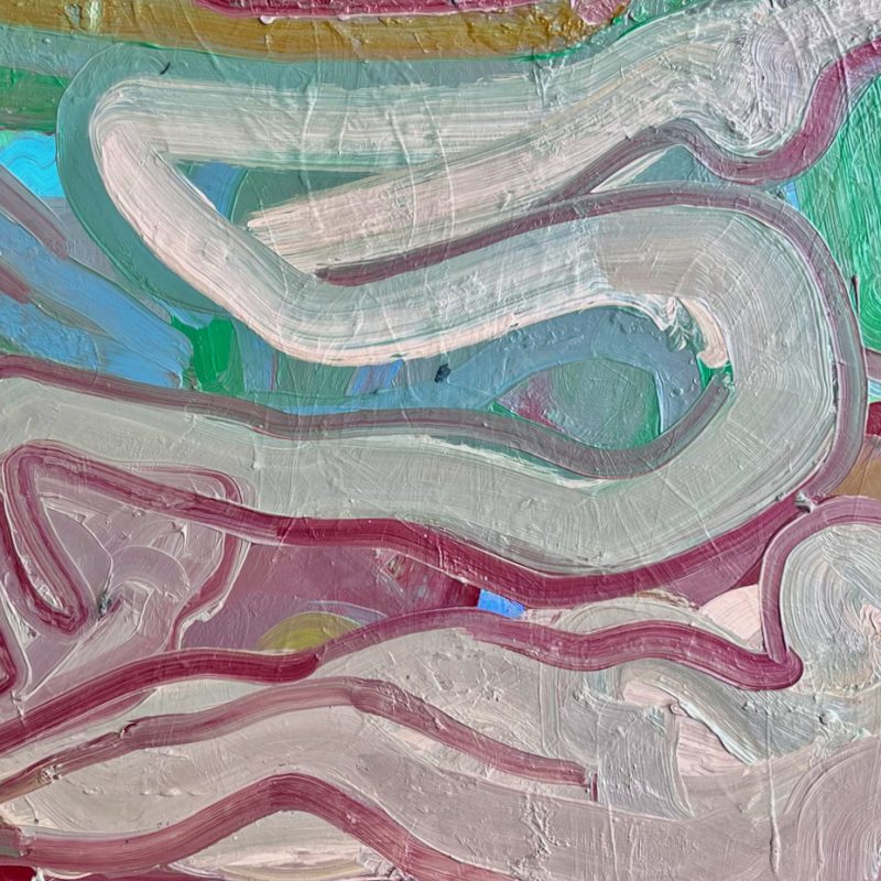 A reclining figure painted in flesh nude, burnt Sienna and green.