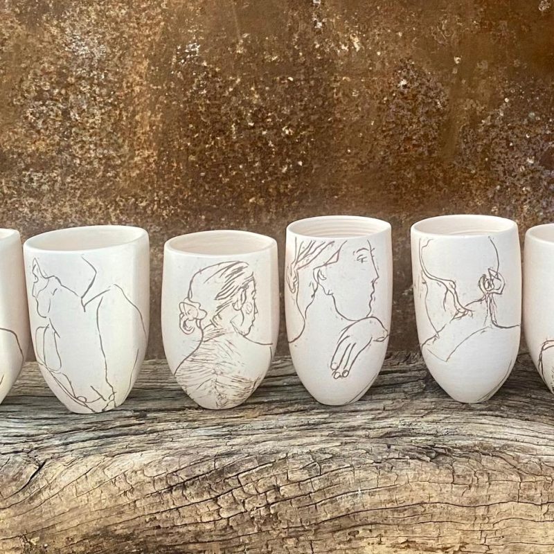 6 porcelain tumblers with black inlay drawings