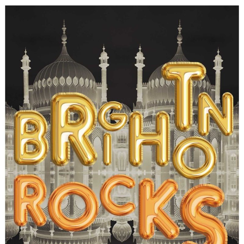 Shiny metallic bubble writing declares 'Brighton Rocks' in front of a shimmering Royal Pavillion