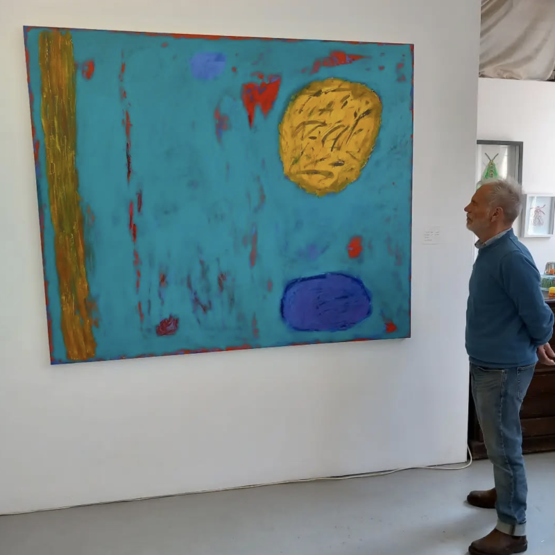 Image of large painting and Colin Day