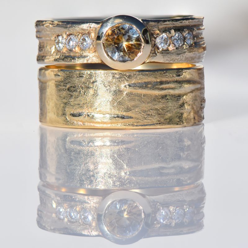 Stack of various handmade rings
