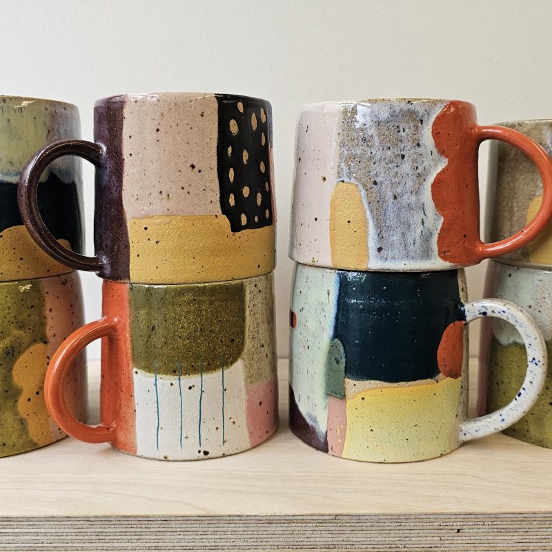 A selection of colourful mugs