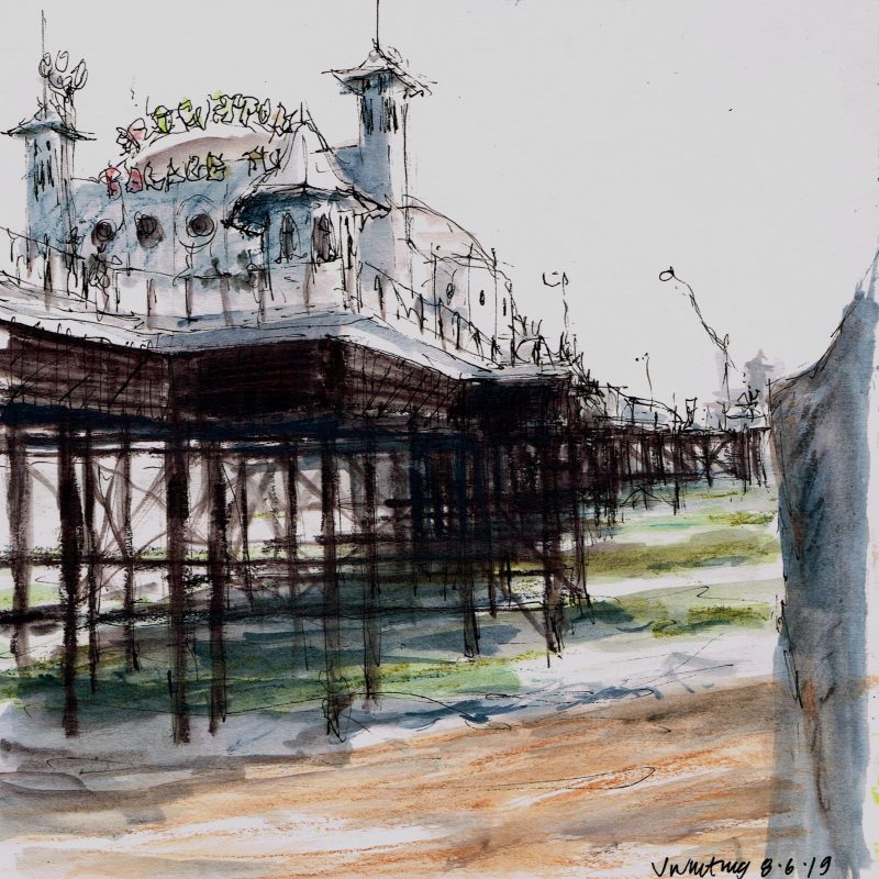 Ink line sketch with coloured ink wash, view of the pier from the beach.