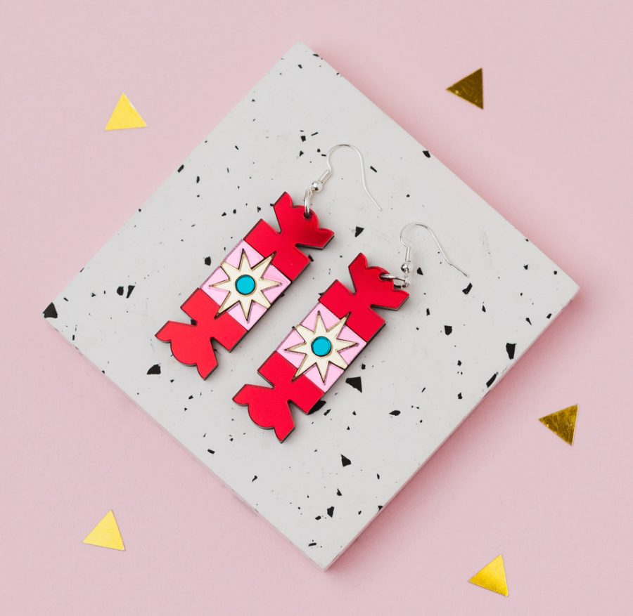 A pair of red and gold Christmas cracker earrings