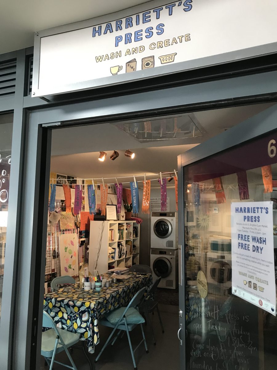 View through door of creative laundry space 