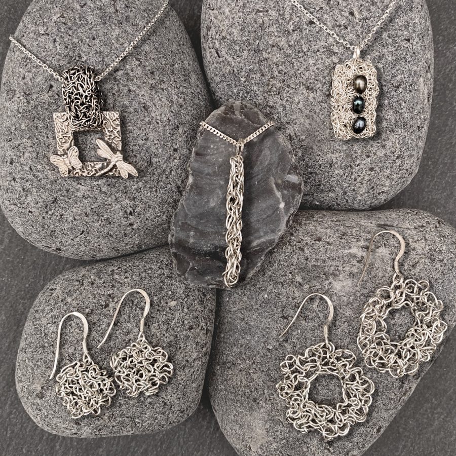 Intricate filigree hand crochet hand textured silver and gem jewellery