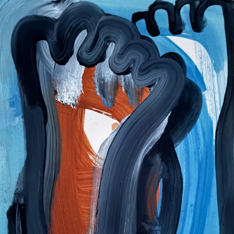 A pair of feet painted in indigo, burnt Sienna and Pale blue.