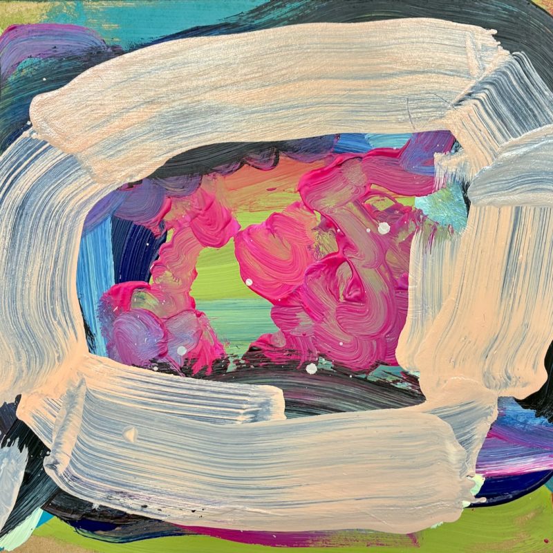 A brightly coloured cell like form in cream and pink.