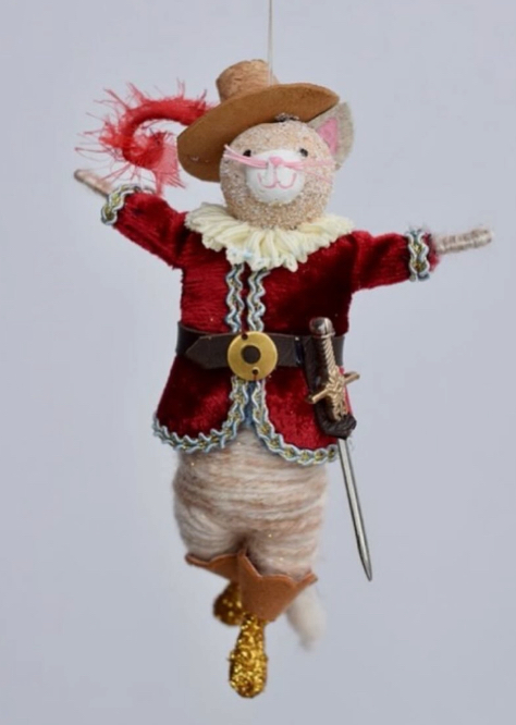 Lovely handmade cat decoration wearing boots , a hat with a feather and outfit in keeping with Hans Cristian Anderson fairy tales Puss in Boots.