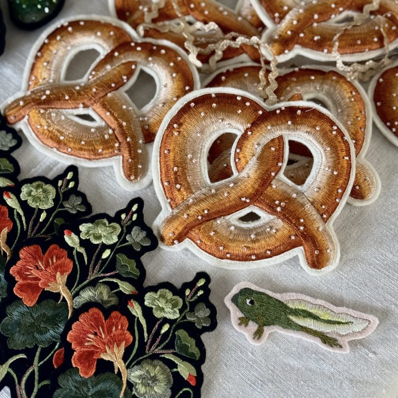 fully embroidered and padded large pretzel decoration, embellished with vintage glass beads.