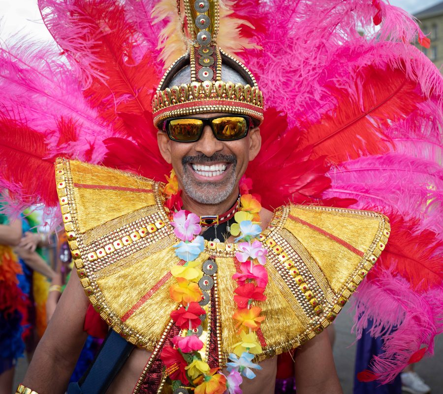 Man dressed as Warrior King with headress