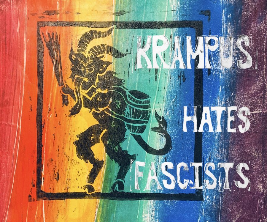 A linoprint by Sea Shucksmith depicting a silhouetted of Krampus, a traditional winter figure with goat-like features carrying a birch rod and a barrel. The background is a rainbow acrylic monoprint.