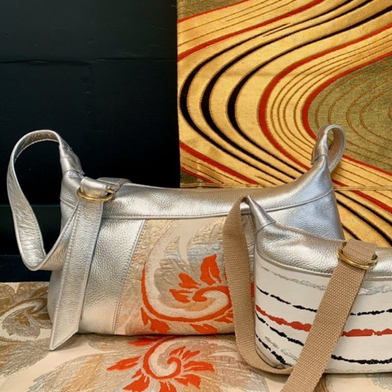 Two crossbosy handbags made from metallic silver leather combined with vintage obi fabric