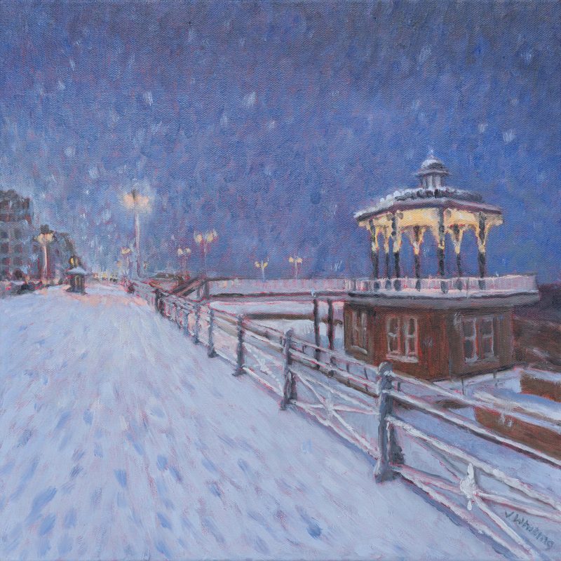 Oil painting of the bandstand on a snowy Brighton seafront, a golden light illuminates the underside of the roof, distant street lights glow, snow is falling.