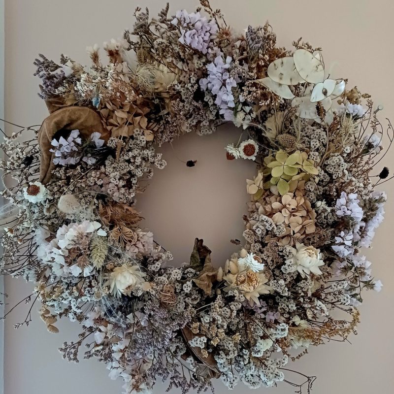 Winter Wreath of natural dried flowers, grasses, and seed heads.