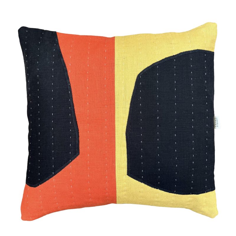A patchwork linen cushion