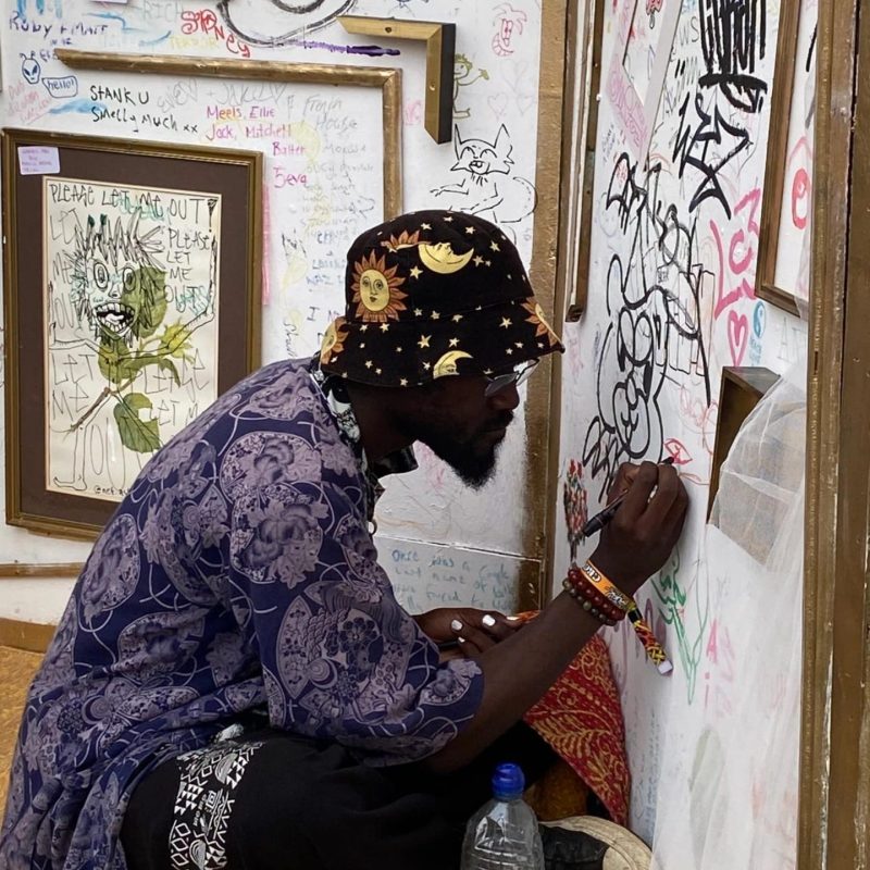 Artist Montel Oke painting 