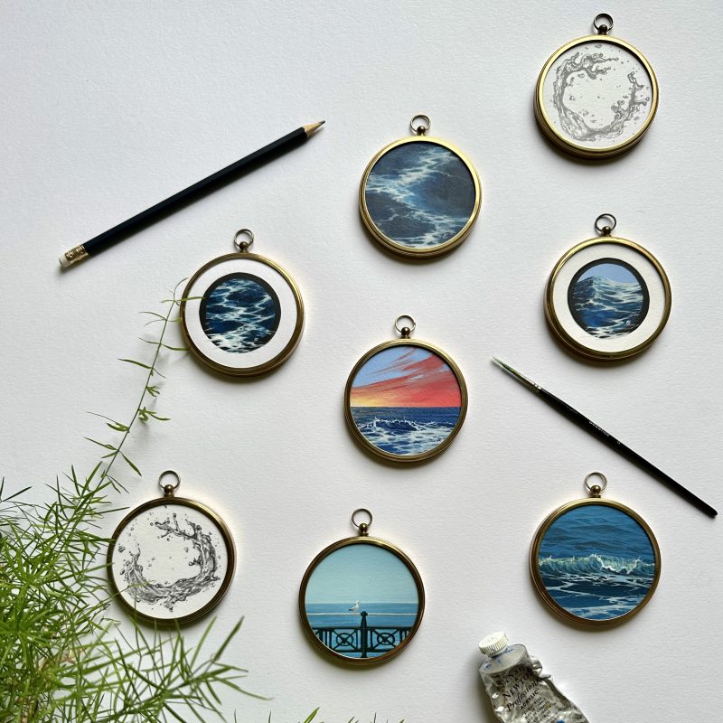 Miniature seascape paintings in round frames