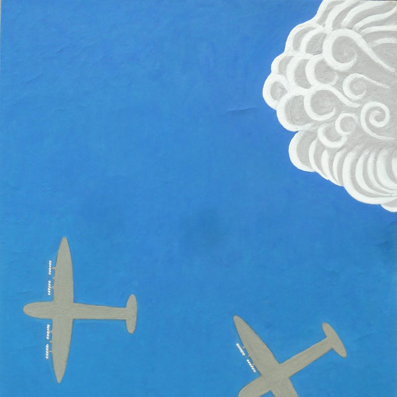 two aeroplanes in the sky with cloud