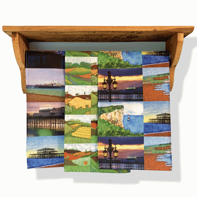 Cotton tea towels of Sussex scenes created by Troy from her original art