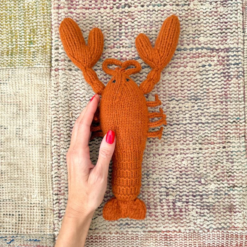 Small hand knitted lobster
