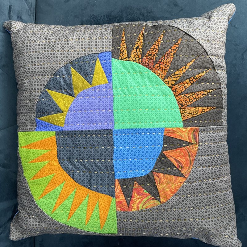 Louise makes a range of beautiful, brightly coloured, quilted cushions