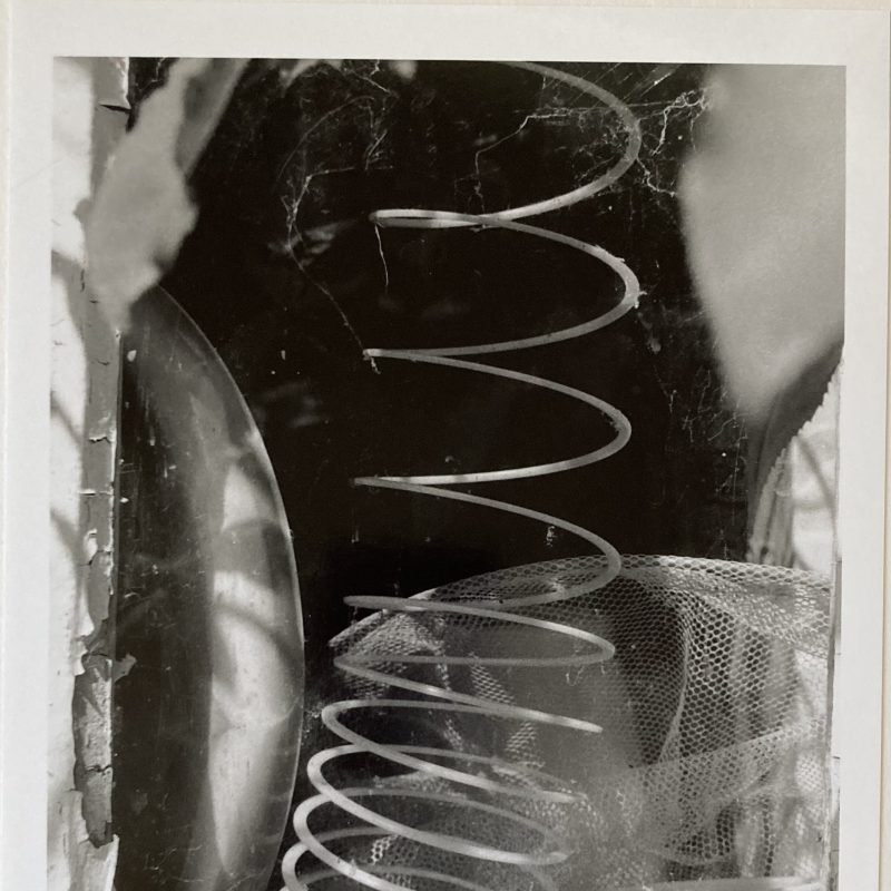 Geometric shapes and shadows created from household rubbish, forming a still life arrangement.