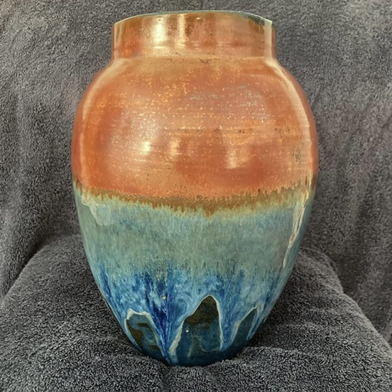 Vase: From the bottom blue gradually changes to deep rich burnt orange