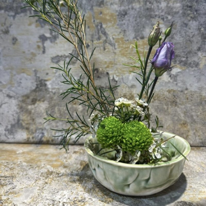 Handmade Raku style pale green tone bowl ideal for creating an oasis of plant calmness