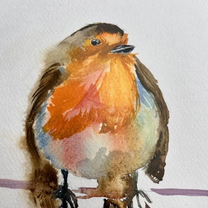 Robin in reds, oranges and browns