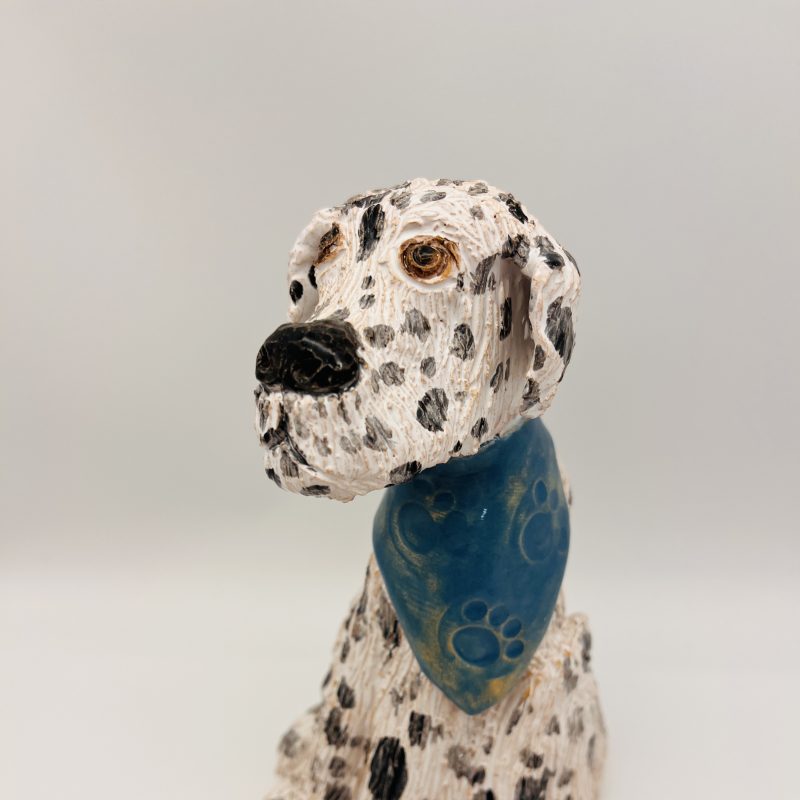 Ceramic dog in white with a blue scarf