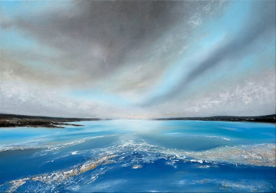 A seascape with looming clouds over a gently swelling, blue sea.