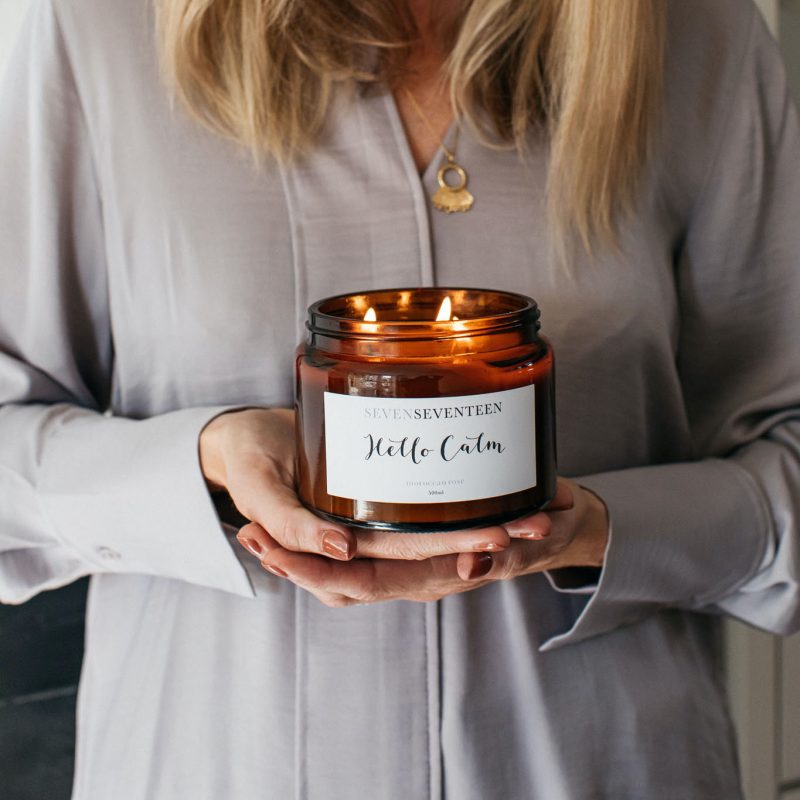 Large candle being held