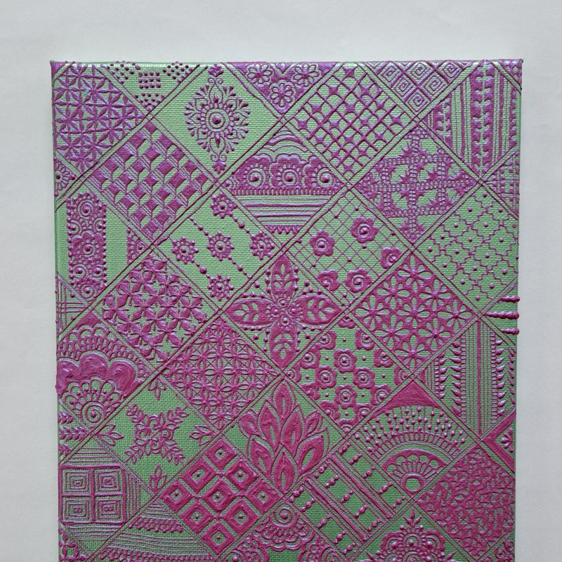 A geometric arrangement of different intricate patterns in pink and green metallic and matt acrylic 