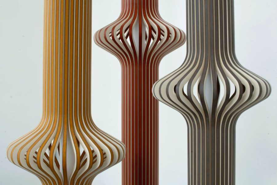 Slimline pendant Lights with a fururistic vibe, formed from profiled strips of laminated board