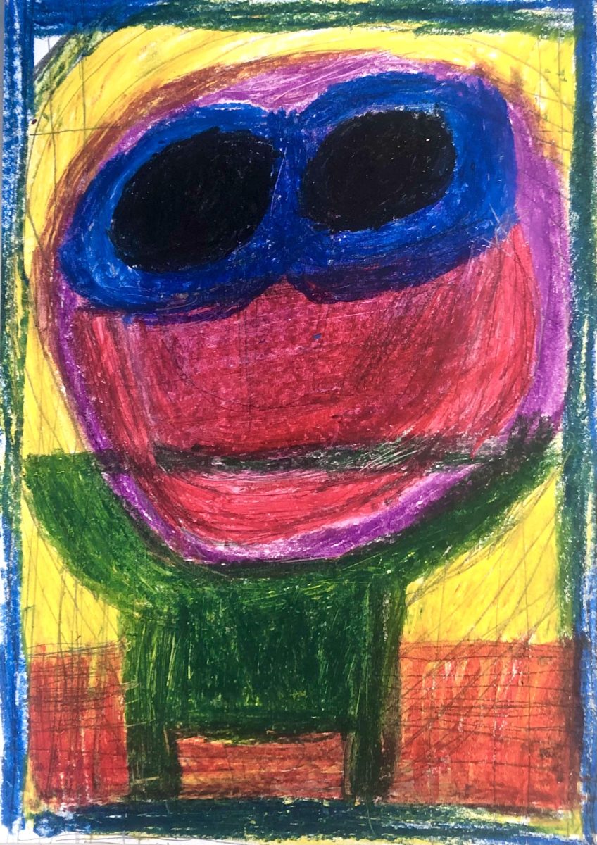 A3 size drawing in oil pastel on paper. A large round red face with purple boarder on yellow background with small body of arms and legs in dark leaf green. The body of the person is standing on a strip of orange ground. Round black eyes on the face with royal blue frames. The face has straight black line for a mouth. The whole drawing has a boarder of dark blue.